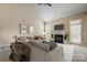 Spacious living room with fireplace and vaulted ceilings at 7750 Trailridge Dr, Tega Cay, SC 29708