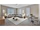 Relaxing living room with sectional sofa and plenty of natural light at 7750 Trailridge Dr, Tega Cay, SC 29708