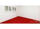 Bedroom with red carpeting and window shutters at 829 Rawlinson Rd, Rock Hill, SC 29732