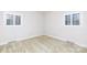 Bright bedroom with two windows and carpeting at 829 Rawlinson Rd, Rock Hill, SC 29732