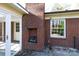 Outdoor brick fireplace and patio area at 829 Rawlinson Rd, Rock Hill, SC 29732