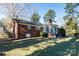 Brick home with sunroom and spacious backyard at 829 Rawlinson Rd, Rock Hill, SC 29732