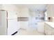 Full view of kitchen with white cabinets and appliances at 829 Rawlinson Rd, Rock Hill, SC 29732