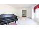 Living room features hardwood floors and a grand piano at 829 Rawlinson Rd, Rock Hill, SC 29732