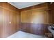 Workshop area with pegboard and wood paneling at 829 Rawlinson Rd, Rock Hill, SC 29732