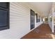 Covered front porch with wooden flooring at 132 Kendra Dr, Mooresville, NC 28117