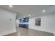 Kitchen with blue cabinets, stainless steel appliances, and white countertops at 1330 Mulberry Ave, Charlotte, NC 28216