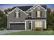 Two-story house with gray siding, two-car garage, and landscaping at 13725 Roderick Dr # 189, Huntersville, NC 28078