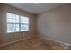 Bright bedroom with neutral walls and carpet flooring at 138 Gray Willow St, Mooresville, NC 28117