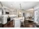 Modern kitchen with gray cabinets, stainless steel appliances, and an island at 143 Valleymist Ln, Mooresville, NC 28117