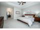 Spacious main bedroom with king-size bed and ensuite bathroom access at 143 Valleymist Ln, Mooresville, NC 28117