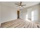 Bedroom with hardwood floors and access to hallway at 2030 Fairhope Rd, York, SC 29745