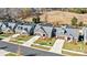 Community of gray craftsman style homes at 5019 Pleasant Run Dr, Matthews, NC 28104