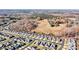 Community overview with various homes and surrounding landscape at 5019 Pleasant Run Dr, Matthews, NC 28104
