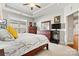 Comfortable bedroom with large window and dresser at 5019 Pleasant Run Dr, Matthews, NC 28104