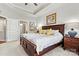 Bright bedroom with ensuite bathroom access and wood floors at 5019 Pleasant Run Dr, Matthews, NC 28104