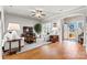 Living room with hardwood floors and shiplap wall at 5019 Pleasant Run Dr, Matthews, NC 28104