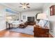 Living room with hardwood floors and shiplap wall at 5019 Pleasant Run Dr, Matthews, NC 28104