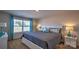 Spacious bedroom with a king-size bed and large window at 5141 Hyrule Dr, Charlotte, NC 28262