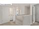 Upstairs hallway with linen closet and neutral decor at 5155 Hyrule Dr, Charlotte, NC 28262