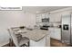 Kitchen island with granite countertop and stainless steel appliances at 5155 Hyrule Dr, Charlotte, NC 28262