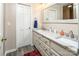 Bathroom featuring double sinks, granite countertop, and white cabinetry at 7812 Hwy 742 Hwy, Marshville, NC 28103