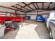 Spacious garage interior with classic cars, a truck, and storage space at 7812 Hwy 742 Hwy, Marshville, NC 28103