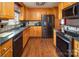 Modern kitchen with stainless steel appliances and wood cabinets at 7812 Hwy 742 Hwy, Marshville, NC 28103