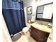 Clean bathroom with a vanity, toilet and shower/tub combo at 901 Huntington Hills Dr, Lincolnton, NC 28092