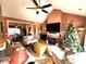 Spacious living room with fireplace and Christmas tree at 901 Huntington Hills Dr, Lincolnton, NC 28092