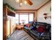 Relaxing sunroom with bay window and seating at 904 S Main St, Landis, NC 28088