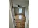 Bright bedroom with hardwood floors, ceiling fan, and large window at 112 Mccray Ave, Kannapolis, NC 28081