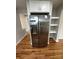 Modern kitchen features stainless steel refrigerator and hardwood floors at 112 Mccray Ave, Kannapolis, NC 28081