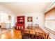 Dining room with parquet floors and a vintage red hutch at 130 21St Nw Ave, Hickory, NC 28601