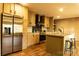 Modern kitchen with stainless steel appliances and light wood cabinets at 145 Eastgate Dr, Statesville, NC 28625