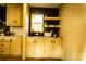 Kitchen features a coffee bar with floating shelves and light wood cabinets at 145 Eastgate Dr, Statesville, NC 28625