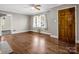 Living room with hardwood floors and wood door at 1586 Kings Rd, Shelby, NC 28150