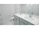 Bathroom with double vanity, large mirror, and hexagon tile floor at 185 Giant Oak Ave, Statesville, NC 28677