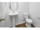 Clean powder room with pedestal sink and toilet at 185 Giant Oak Ave, Statesville, NC 28677