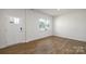 Entryway featuring hardwood floors and a charming front door at 185 Giant Oak Ave, Statesville, NC 28677