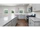 Modern kitchen featuring granite countertops and stainless steel appliances at 185 Giant Oak Ave, Statesville, NC 28677