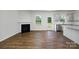 Open concept living area with hardwood floors and gas fireplace at 185 Giant Oak Ave, Statesville, NC 28677
