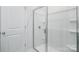 Clean shower with glass enclosure and built-in shelves at 185 Giant Oak Ave, Statesville, NC 28677