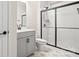 Modern bathroom with gray vanity and a glass shower at 4027 Charlton Rd, Fort Mill, SC 29715