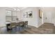 Dining room with marble table and six chairs, hardwood floors at 4027 Charlton Rd, Fort Mill, SC 29715