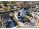 High-angle view of a residential neighborhood with houses, streets, and trees at 5622 Grey Dogwood Ct, Charlotte, NC 28269