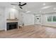 Bright living room with hardwood floors, fireplace and access to the exterior at 791 S Grove St, Lincolnton, NC 28092