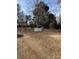 Spacious backyard with a white picket fence and trees at 915 Mt Gallant Rd, Rock Hill, SC 29730