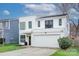 Two-story modern white house with attached garage at 1220 Lomax Ave, Charlotte, NC 28211