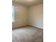 Empty bedroom with neutral walls and carpeted flooring at 1305 Dodd St, Shelby, NC 28152
